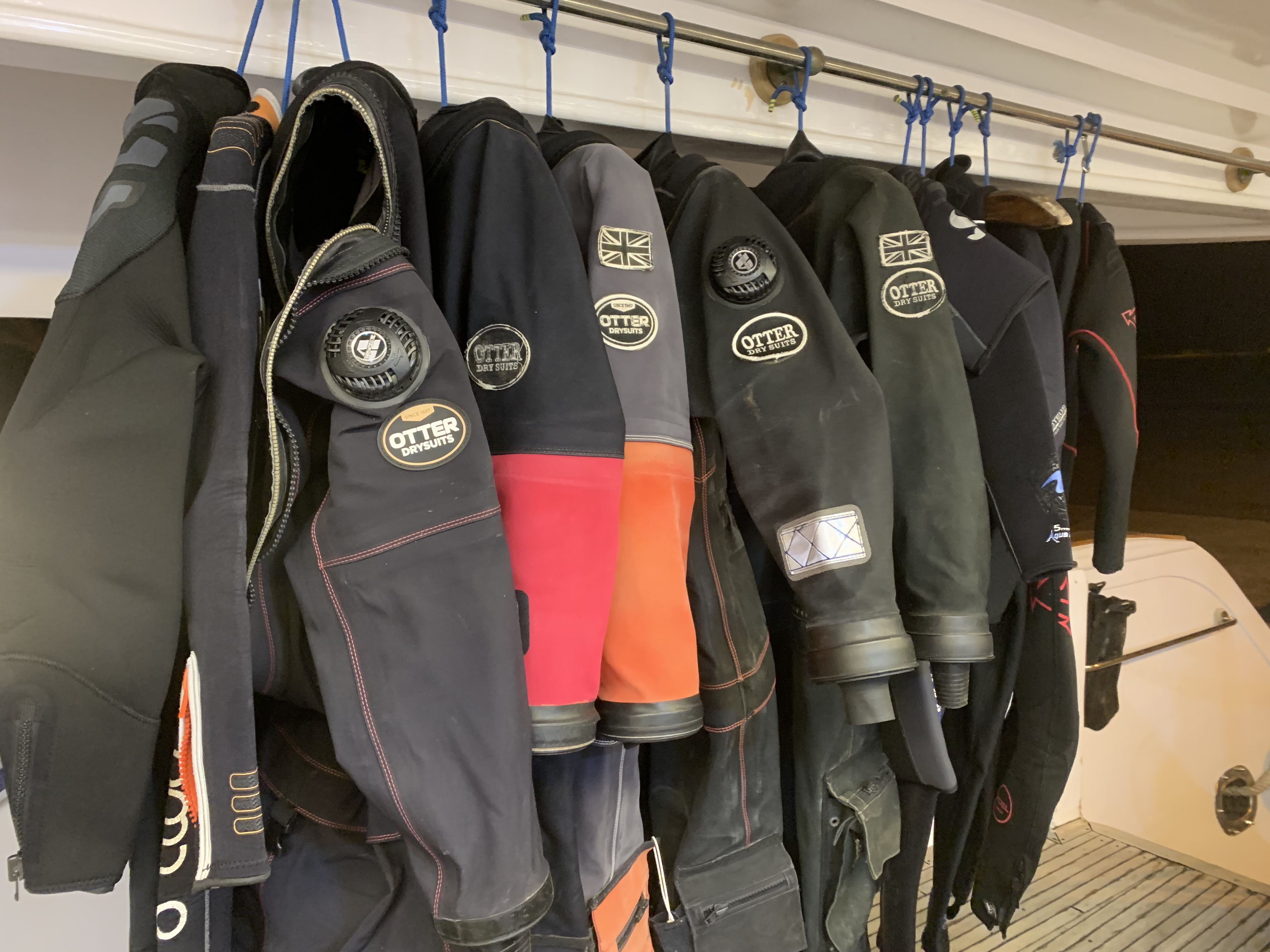 Otter dry suits ready for diving in the Red Sea, Egypt